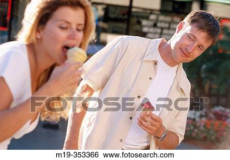 couple eating ice cream cone View Large Photo Image Stock Photograph - couple eating ice cream cone. Fotosearch
