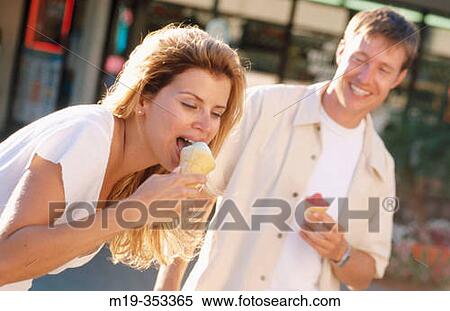 couple eating ice cream cone View Large Photo Image Stock Photography - couple eating ice cream cone. Fotosearch