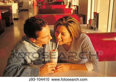 Couple eating ice-cream View Large Photo Image Stock Image - Couple eating ice-cream. Fotosearch