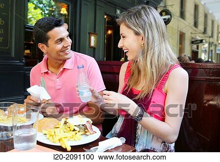 Couple eating in a restaurant. San Sebastian. Donostia. Gipuzkoa. Basque Country. Spain. View Large Photo Image Stock Image - Couple eating in a restaurant. San Sebastian. Donostia. Gipuzkoa. Basque Country. Spain.. Fotosearch