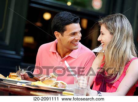 Couple eating in a restaurant. San Sebastian. Donostia. Gipuzkoa. Basque Country. Spain. View Large Photo Image Stock Image - Couple eating in a restaurant. San Sebastian. Donostia. Gipuzkoa. Basque Country. Spain.. Fotosearch