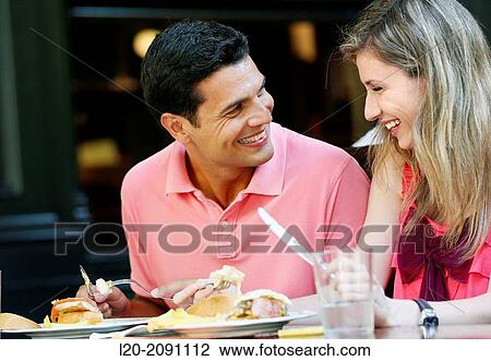 Couple eating in a restaurant. San Sebastian. Donostia. Gipuzkoa. Basque Country. Spain. View Large Photo Image Stock Image - Couple eating in a restaurant. San Sebastian. Donostia. Gipuzkoa. Basque Country. Spain.. Fotosearch