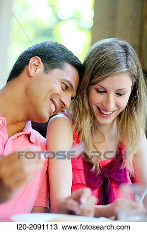 Couple eating in a restaurant. San Sebastian. Donostia. Gipuzkoa. Basque Country. Spain. View Large Photo Image Stock Image - Couple eating in a restaurant. San Sebastian. Donostia. Gipuzkoa. Basque Country. Spain.. Fotosearch