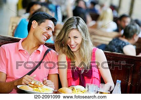 Couple eating in a restaurant. San Sebastian. Donostia. Gipuzkoa. Basque Country. Spain. View Large Photo Image Stock Photo - Couple eating in a restaurant. San Sebastian. Donostia. Gipuzkoa. Basque Country. Spain.. Fotosearch