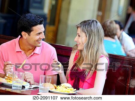 Stock Photo - Couple eating in a restaurant. San Sebastian. Donostia. Gipuzkoa. Basque Country. Spain.. Fotosearch