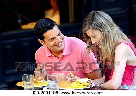 Couple eating in a restaurant. San Sebastian. Donostia. Gipuzkoa. Basque Country. Spain. View Large Photo Image Stock Photo - Couple eating in a restaurant. San Sebastian. Donostia. Gipuzkoa. Basque Country. Spain.. Fotosearch