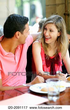 Couple eating in a restaurant. San Sebastian. Donostia. Gipuzkoa. Basque Country. Spain. View Large Photo Image Stock Photo - Couple eating in a restaurant. San Sebastian. Donostia. Gipuzkoa. Basque Country. Spain.. Fotosearch