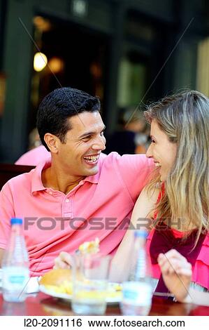 Couple eating in a restaurant. San Sebastian. Donostia. Gipuzkoa. Basque Country. Spain. View Large Photo Image Stock Photograph - Couple eating in a restaurant. San Sebastian. Donostia. Gipuzkoa. Basque Country. Spain.. Fotosearch
