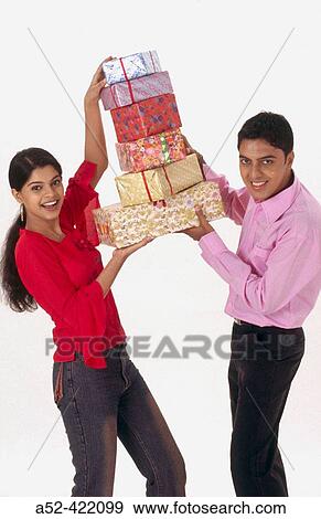 Stock Photo - Couple enjoying shopping.. Fotosearch