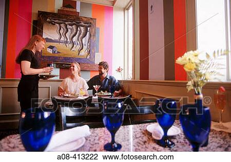 Couple enjoys a romantic meal. Philadelphia. Pennsylvania. USA. View Large Photo Image Stock Image - Couple enjoys a romantic meal. Philadelphia. Pennsylvania. USA.. Fotosearch