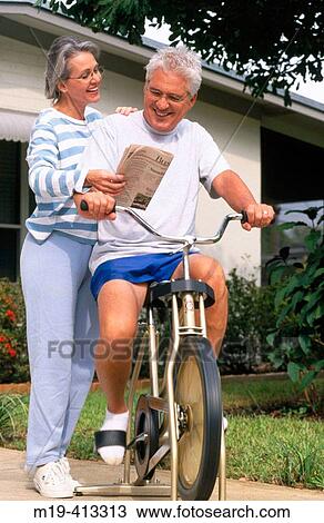 Stock Image - couple exercising in the morning. Fotosearch