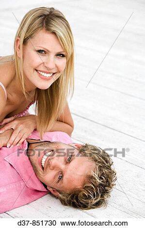 Stock Image - Couple happy at home. Fotosearch