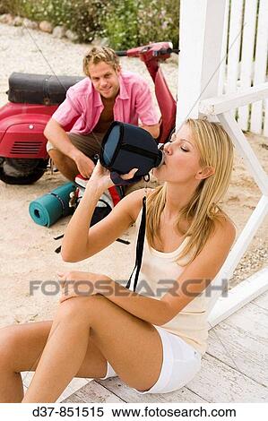 Couple having a rest on a country trip View Large Photo Image Stock Photography - Couple having a rest on a country trip. Fotosearch