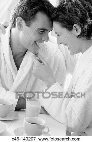 Couple having breakfast View Large Photo Image Stock Photo - Couple having breakfast. Fotosearch