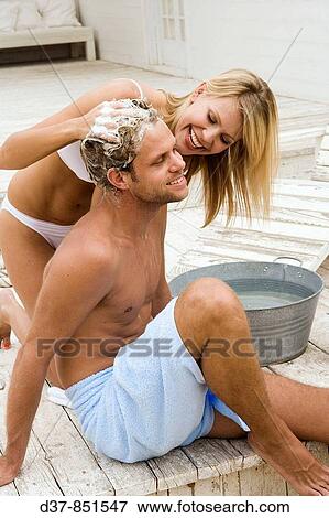 Couple having fun at home View Large Photo Image Stock Photo - Couple having fun at home. Fotosearch