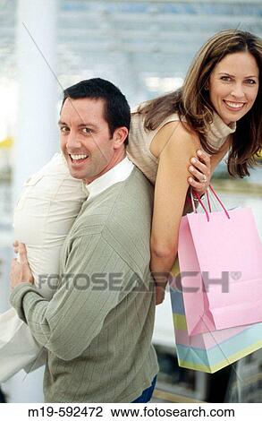 couple having fun shopping View Large Photo Image Stock Image - couple having fun shopping. Fotosearch