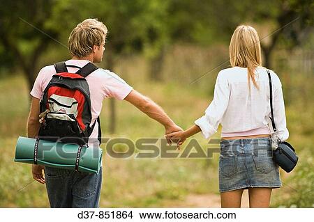 Couple hiking View Large Photo Image Picture - Couple hiking. Fotosearch