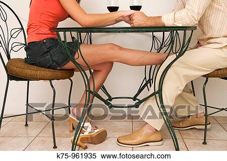 couple holding hands and being playful View Large Photo Image Stock Photography - couple holding hands and being playful. Fotosearch