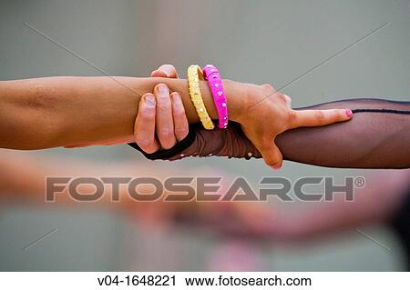 Couple holding hands at a dancing competition in Germany, Europe View Large Photo Image Stock Image - Couple holding hands at a dancing competition in Germany, Europe. Fotosearch