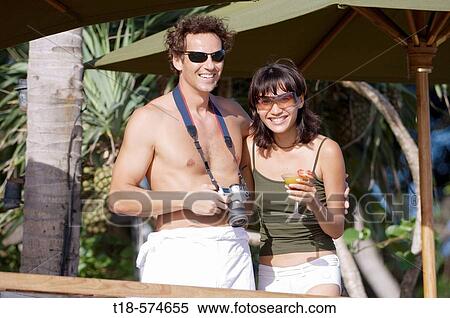 couple holidaying and taking snapshot View Large Photo Image Stock Photography - couple holidaying and taking snapshot. Fotosearch