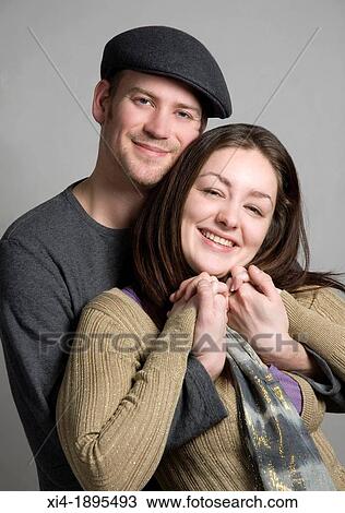 couple hugged and holding hands View Large Photo Image Stock Image - couple hugged and holding hands. Fotosearch