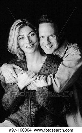 Couple hugging View Large Photo Image Picture - Couple hugging. Fotosearch