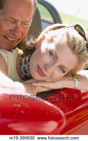 couple in a car View Large Photo Image Stock Image - couple in a car. Fotosearch