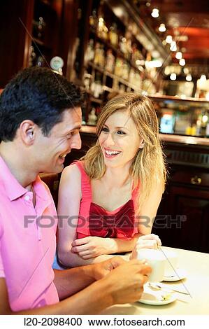 Stock Image - Couple in a coffee bar. San Sebastian. Donostia. Gipuzkoa. Basque Country. Spain.. Fotosearch