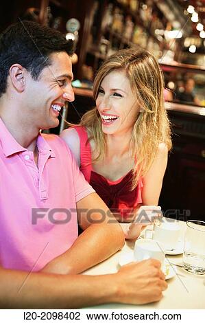 Stock Image - Couple in a coffee bar. San Sebastian. Donostia. Gipuzkoa. Basque Country. Spain.. Fotosearch