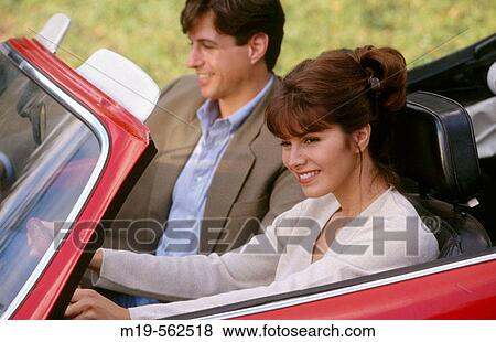 Stock Photo - couple in a convertible. Fotosearch
