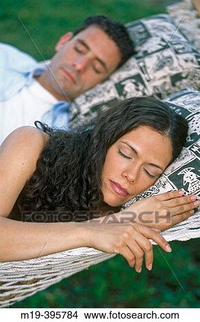 couple in a hammock asleep View Large Photo Image Picture - couple in a hammock asleep. Fotosearch