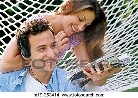 couple in a hammock View Large Photo Image Picture - couple in a hammock. Fotosearch