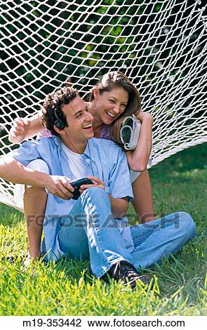 couple in a hammock View Large Photo Image Stock Image - couple in a hammock. Fotosearch