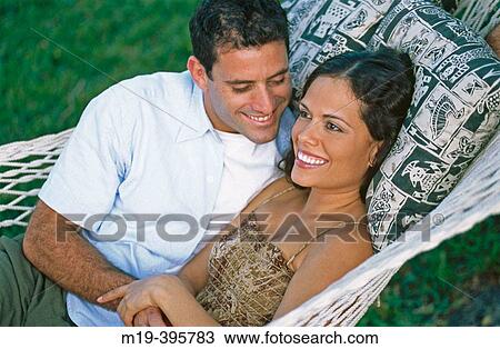 couple in a hammock View Large Photo Image Stock Image - couple in a hammock. Fotosearch