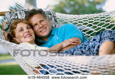couple in a hammock View Large Photo Image Stock Photo - couple in a hammock. Fotosearch