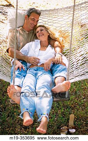 couple in a hammock View Large Photo Image Stock Photography - couple in a hammock. Fotosearch