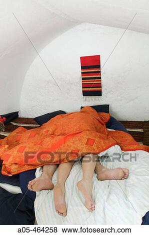 Couple in a loving attitude in a room of the igloo hotel. Hotel Kakslauttanen. Lapland. Ivalo. Finlandia View Large Photo Image Stock Photo - Couple in a loving attitude in a room of the igloo hotel. Hotel Kakslauttanen. Lapland. Ivalo. Finlandia. Fotosearch