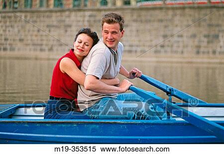 couple in a row boat View Large Photo Image Stock Photography - couple in a row boat. Fotosearch