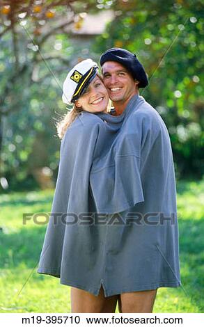Stock Image - couple in an oversized shirt. Fotosearch
