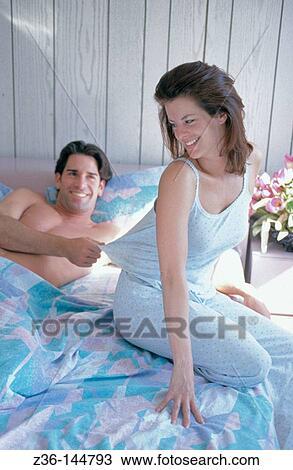 Couple in bed View Large Photo Image Stock Image - Couple in bed. Fotosearch