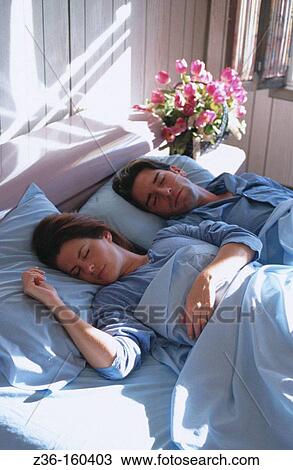 Couple in bed View Large Photo Image Stock Image - Couple in bed. Fotosearch