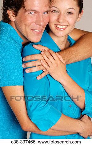 Stock Photograph - couple in blue. Fotosearch
