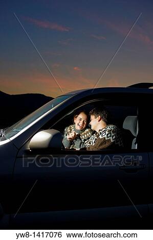 Couple in car, Snaefellsnes Peninsula, Iceland View Large Photo Image Stock Photograph - Couple in car, Snaefellsnes Peninsula, Iceland. Fotosearch