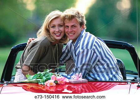 Couple in car View Large Photo Image Stock Photograph - Couple in car. Fotosearch
