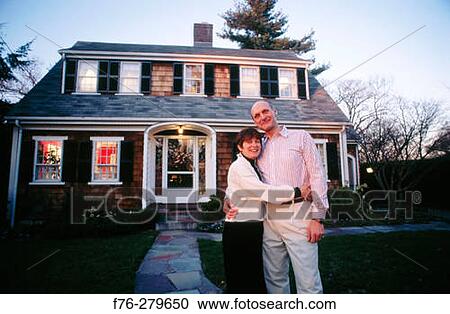 Couple in front of suburban house. Newton. Massachusetts. USA View Large Photo Image Stock Image - Couple in front of suburban house. Newton. Massachusetts. USA. Fotosearch