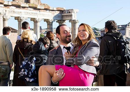 Couple in front of the Roman Forum Rome Italy View Large Photo Image Stock Photo - Couple in front of the Roman Forum Rome Italy. Fotosearch