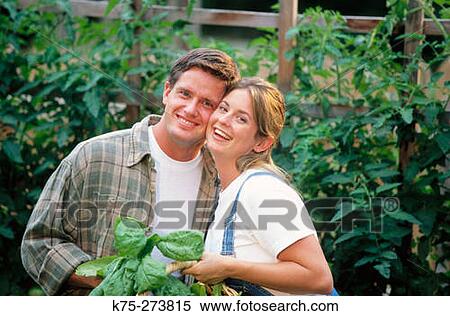 Stock Photography - couple in garden. Fotosearch