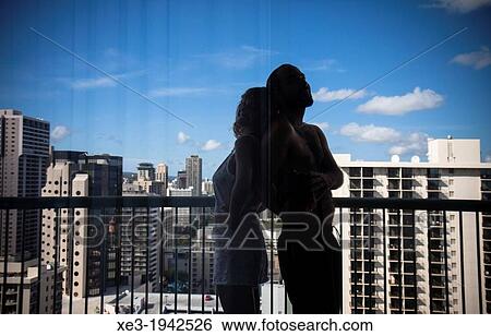 Couple in hotel, Honolulu, Oahu, Hawaii View Large Photo Image Stock Photograph - Couple in hotel, Honolulu, Oahu, Hawaii. Fotosearch