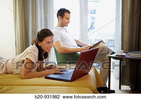 Couple in hotel room View Large Photo Image Stock Image - Couple in hotel room. Fotosearch