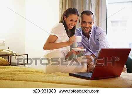 Couple in hotel room View Large Photo Image Stock Image - Couple in hotel room. Fotosearch